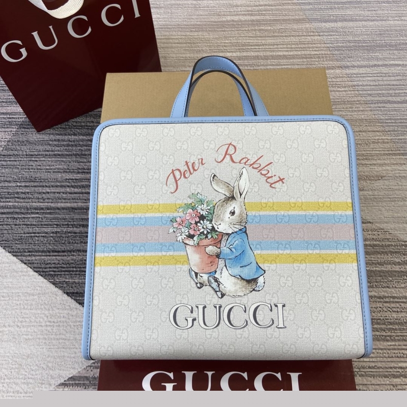 G*u*i shopping bags